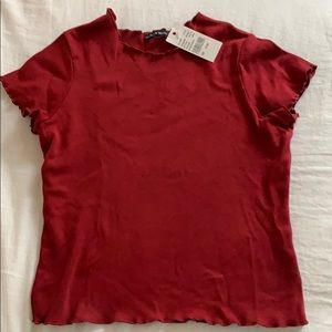 maroon t-shirt with ruffle sleeves
